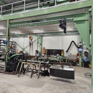 Kraan kleur groen Heer land water kolomkraan zwenkkraan werklast ketting kettingtakel